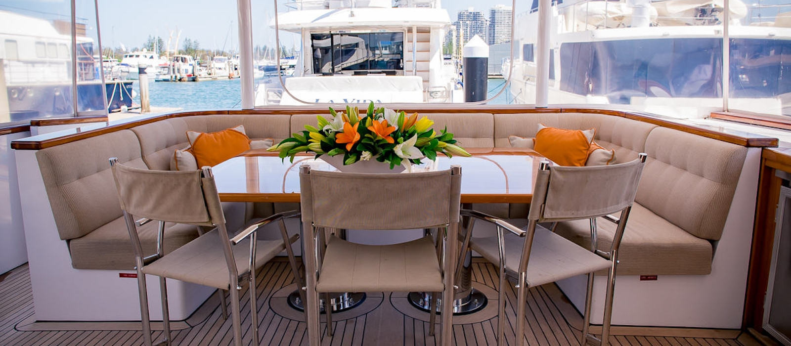 Aft deck dining on Phoenix One super yacht hire
