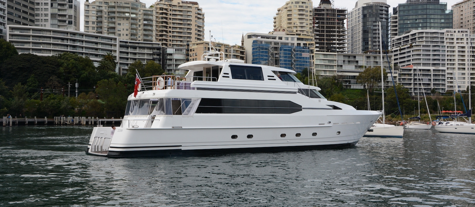 Stern view of AQA luxury boat hire at Lavender Bay