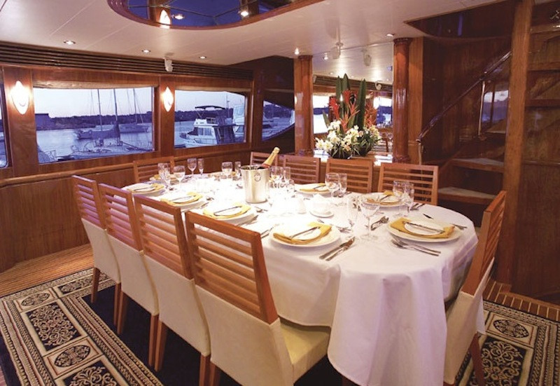 Formal dining on luxury boat hire Oceanos
