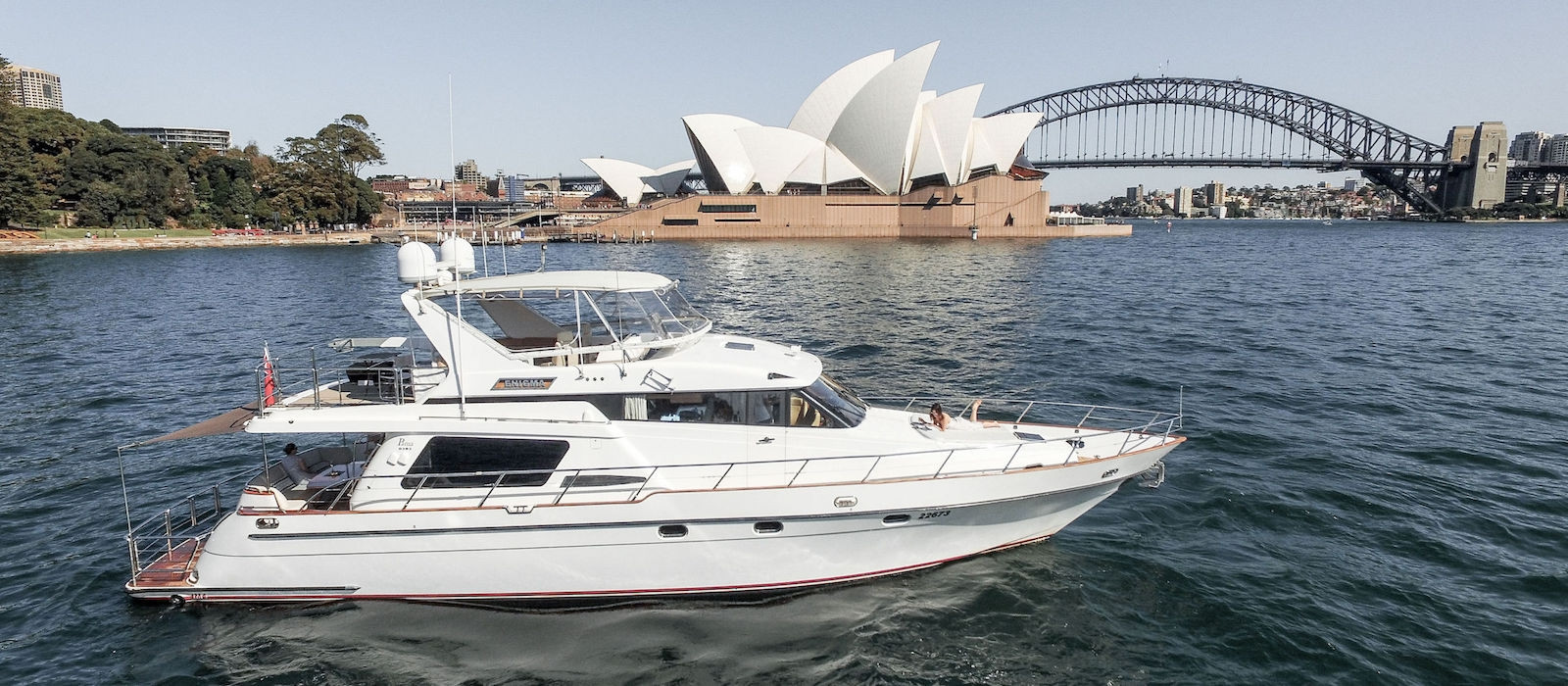 Enigma luxury boat hire with Opera House background