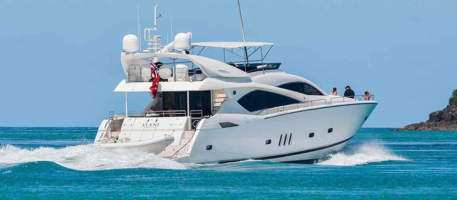 Stern view of luxury boat hire on Alani cruising