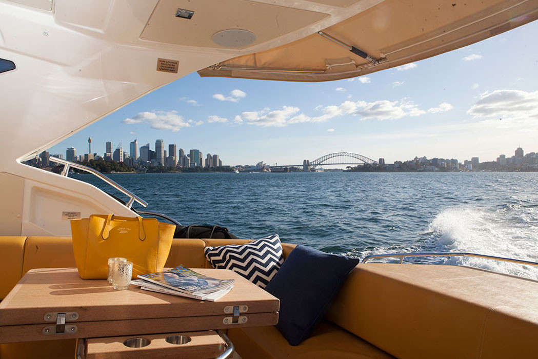 Aft deck lounge on Aqualuxe luxury boat hire