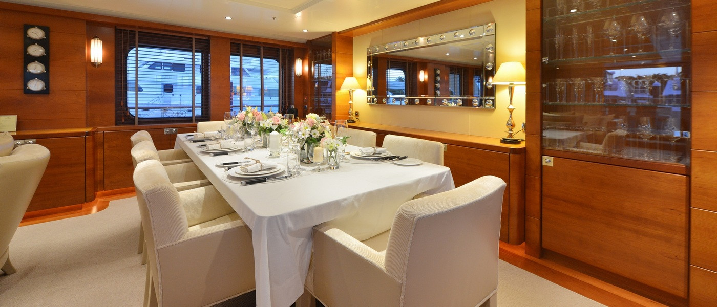 formal dining on Beluga luxury boat hire