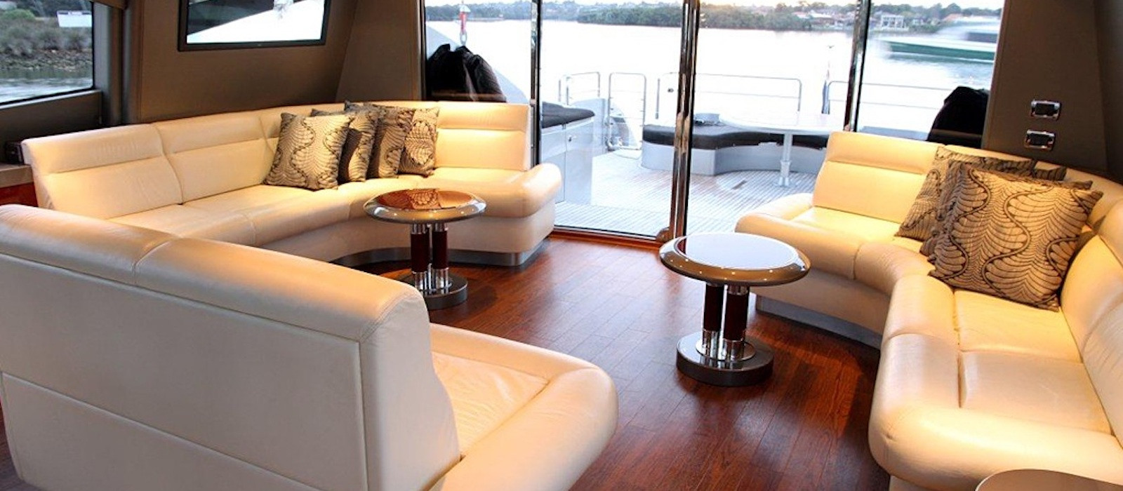 Ghost I luxury boat hire on plush leather lounges
