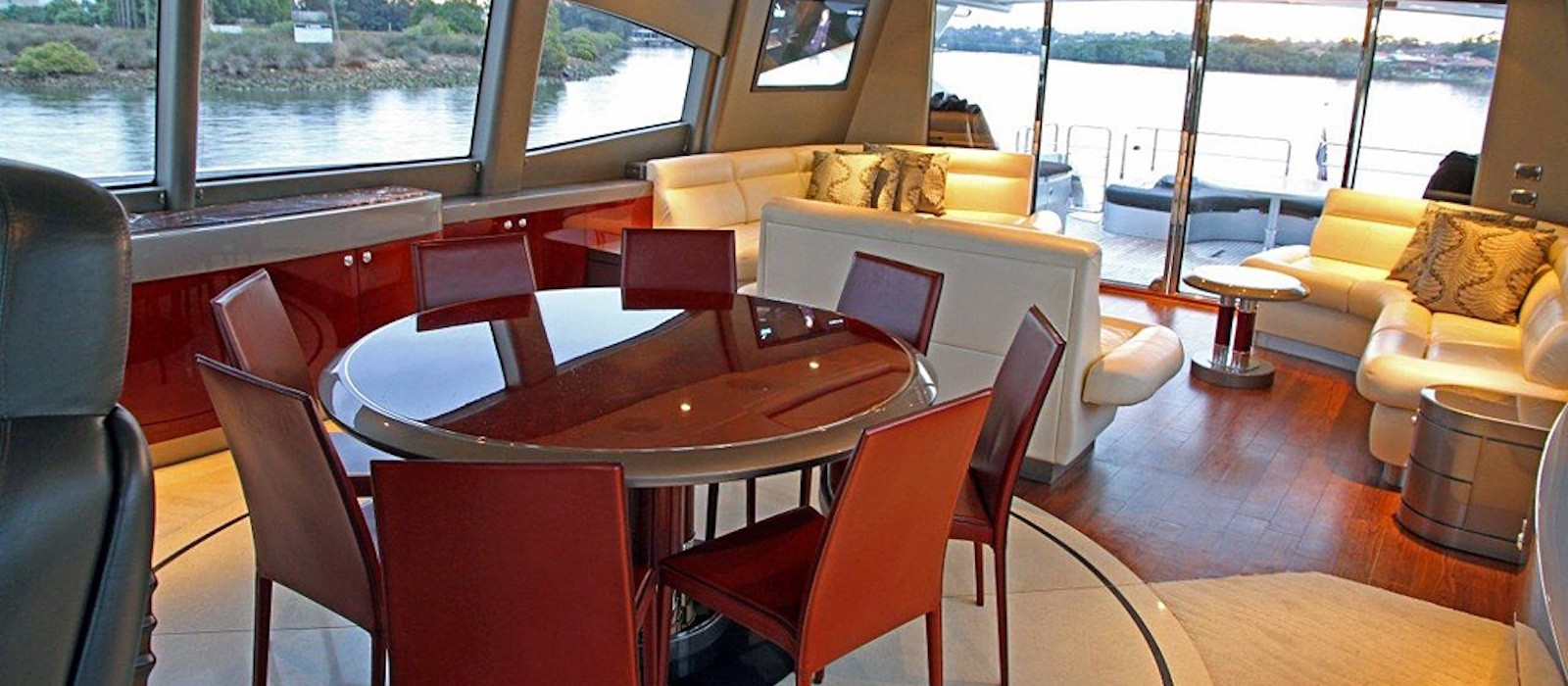 Dining and lounge on Ghost I luxury boat hire