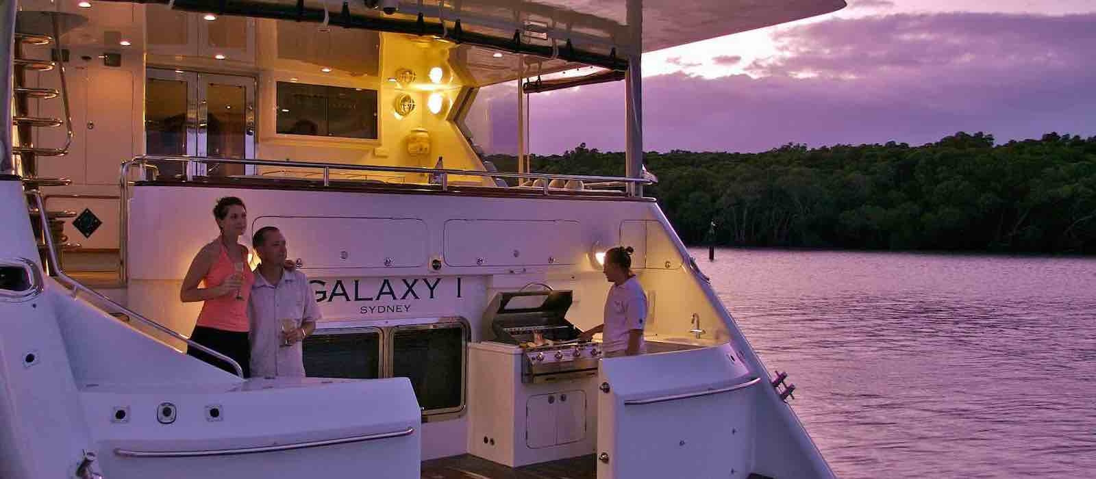 Aft deck swim platform and BBQ on Galaxy I luxury boat hire Whitsundays