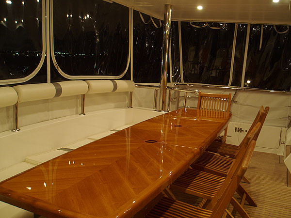 Aft deck dining on Oceanos luxury boat hire