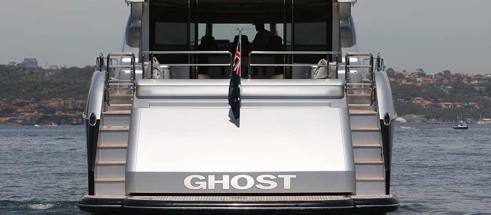 Rear view of Ghost I luxury boat hire