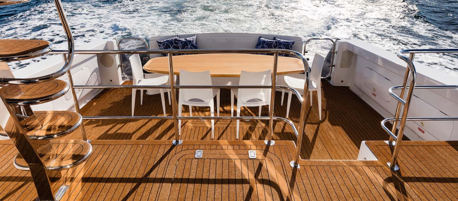 Sunny rear deck on State of The Art luxury boat hire