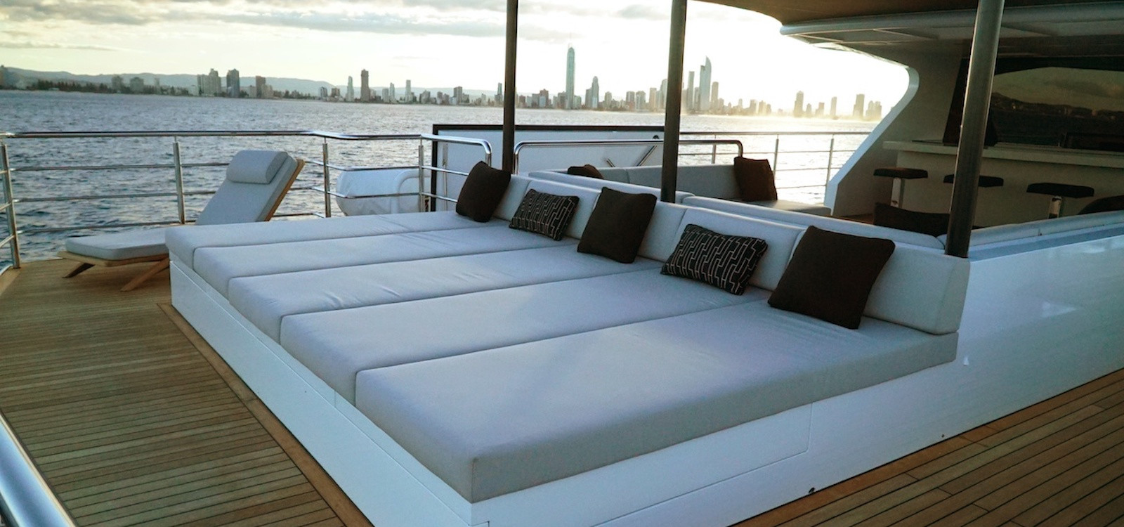 Sahana superyacht hire sunbeds on top deck