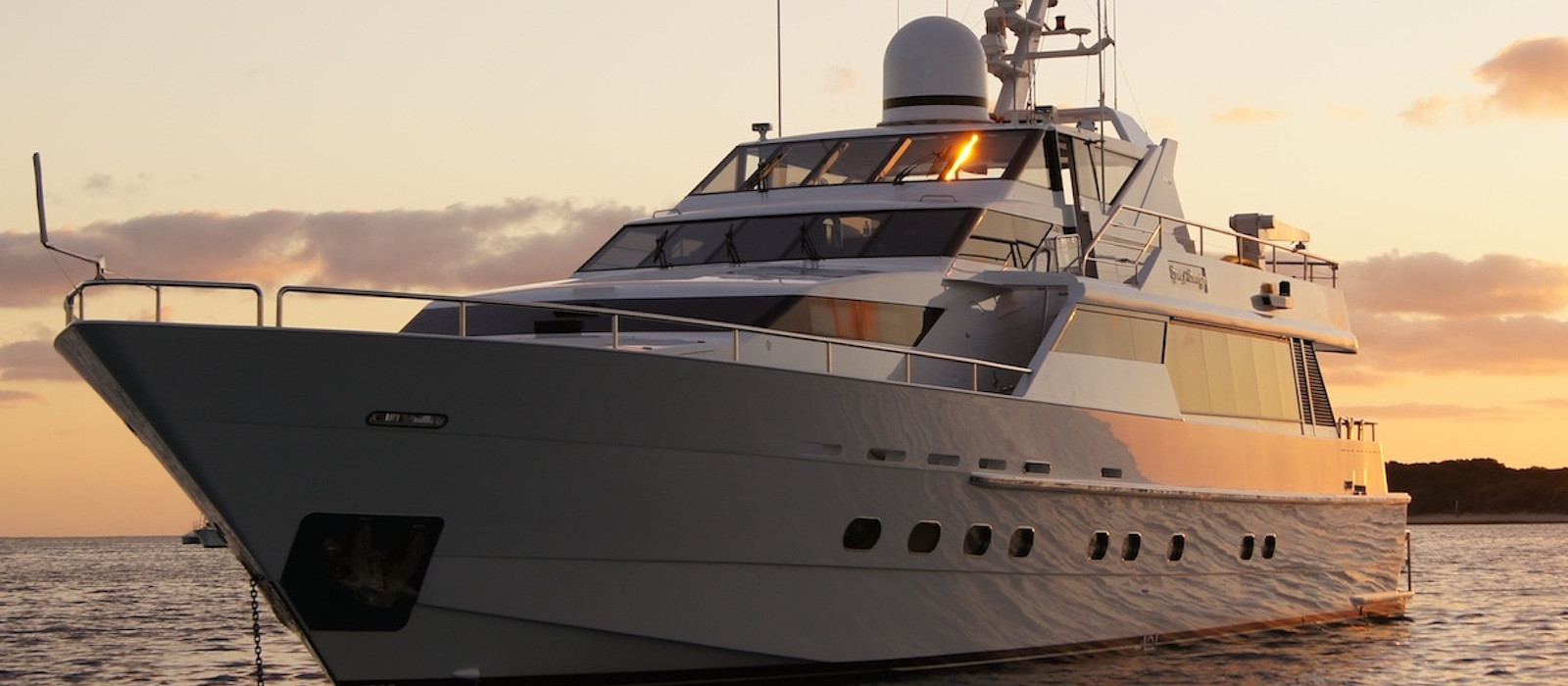 Oscar II superyacht hire as the sun sets